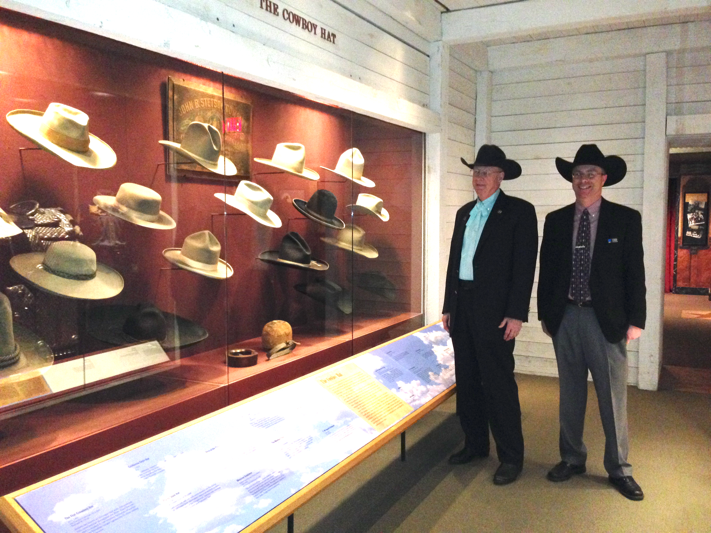 Father and Son Admiring the Hats at the National Western Heritage Museum in Oklahoma City